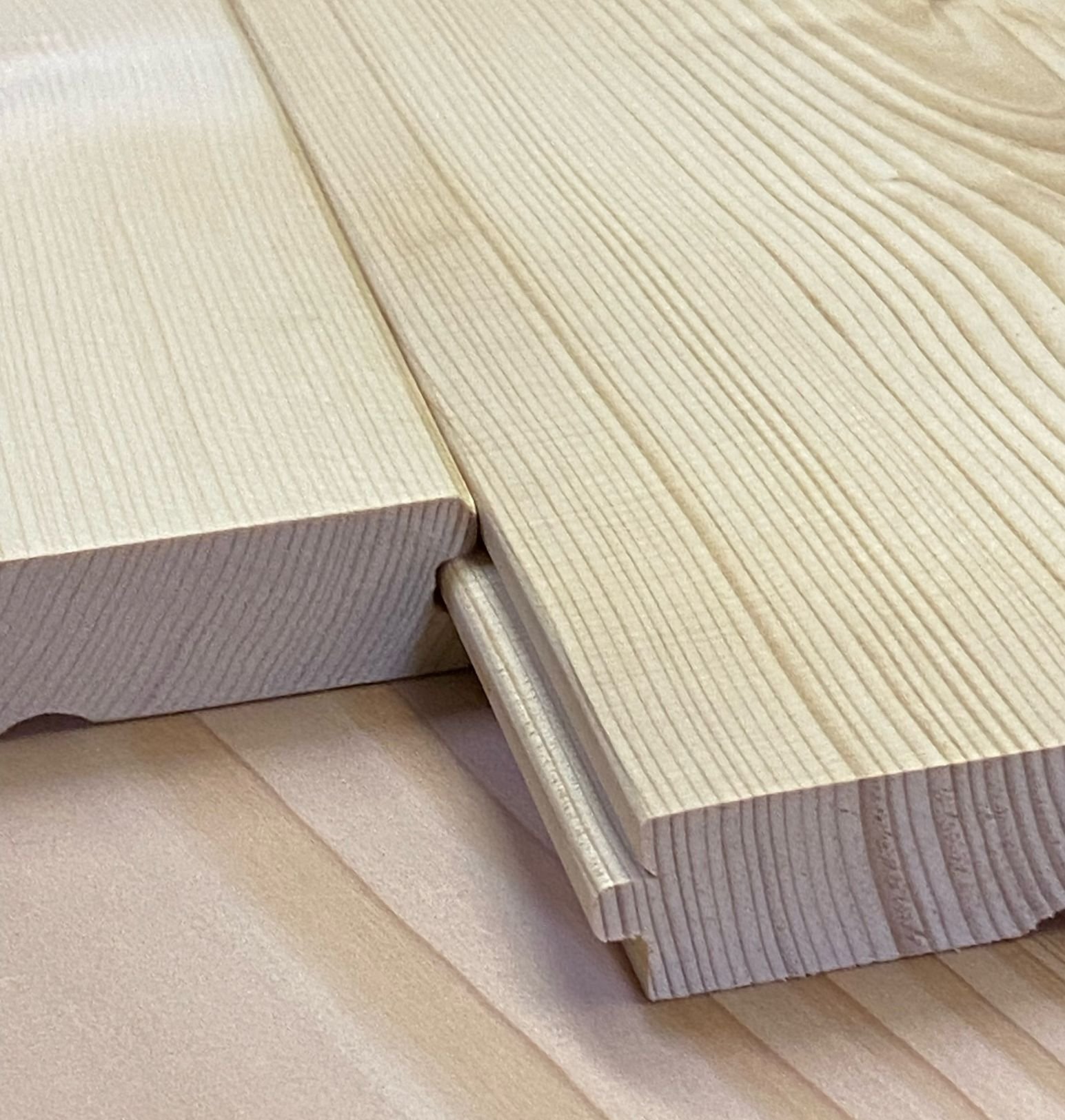 Close-up of tongue-and-groove profile milled into SRL board stock.